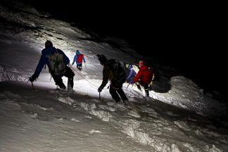 Mountain rescue launched after three climbers injured in severe weather
