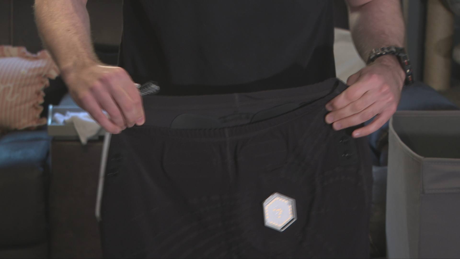 Dad's electronic suit helps him play with kids