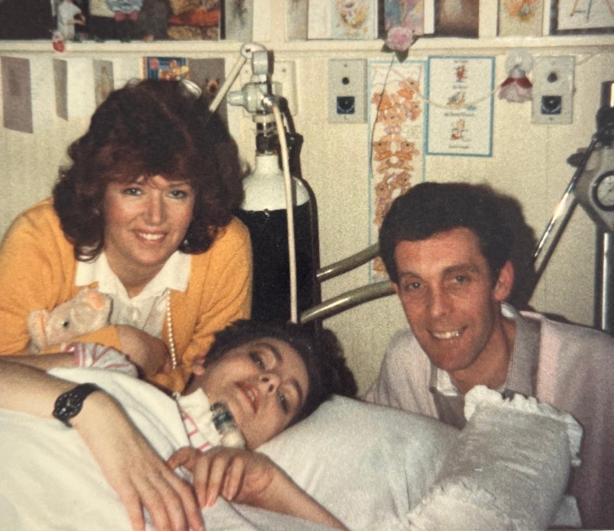 Yvonne with her parents in hospital after the accident
