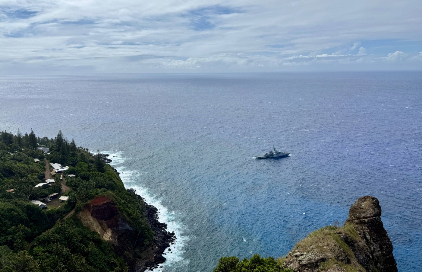 HMS Tamar patrolling the tiny Pacific island