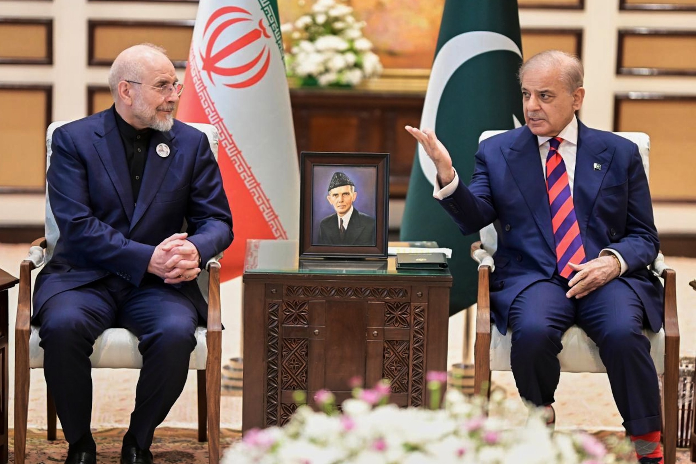 Iran’s Parliament Speaker Mohammad Bagher Ghalibaf, left, meets with Pakistani Prime Minister Shehbaz Sharif in Islamabad