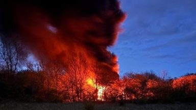 Thick plumes of smoke visible for miles as fire crews battle building blaze in Fife