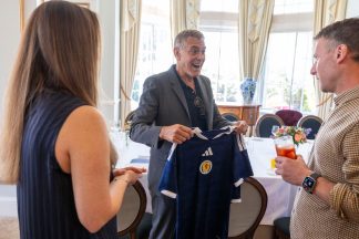 George Clooney given Scotland strip by mum who won Gleneagles lunch competition