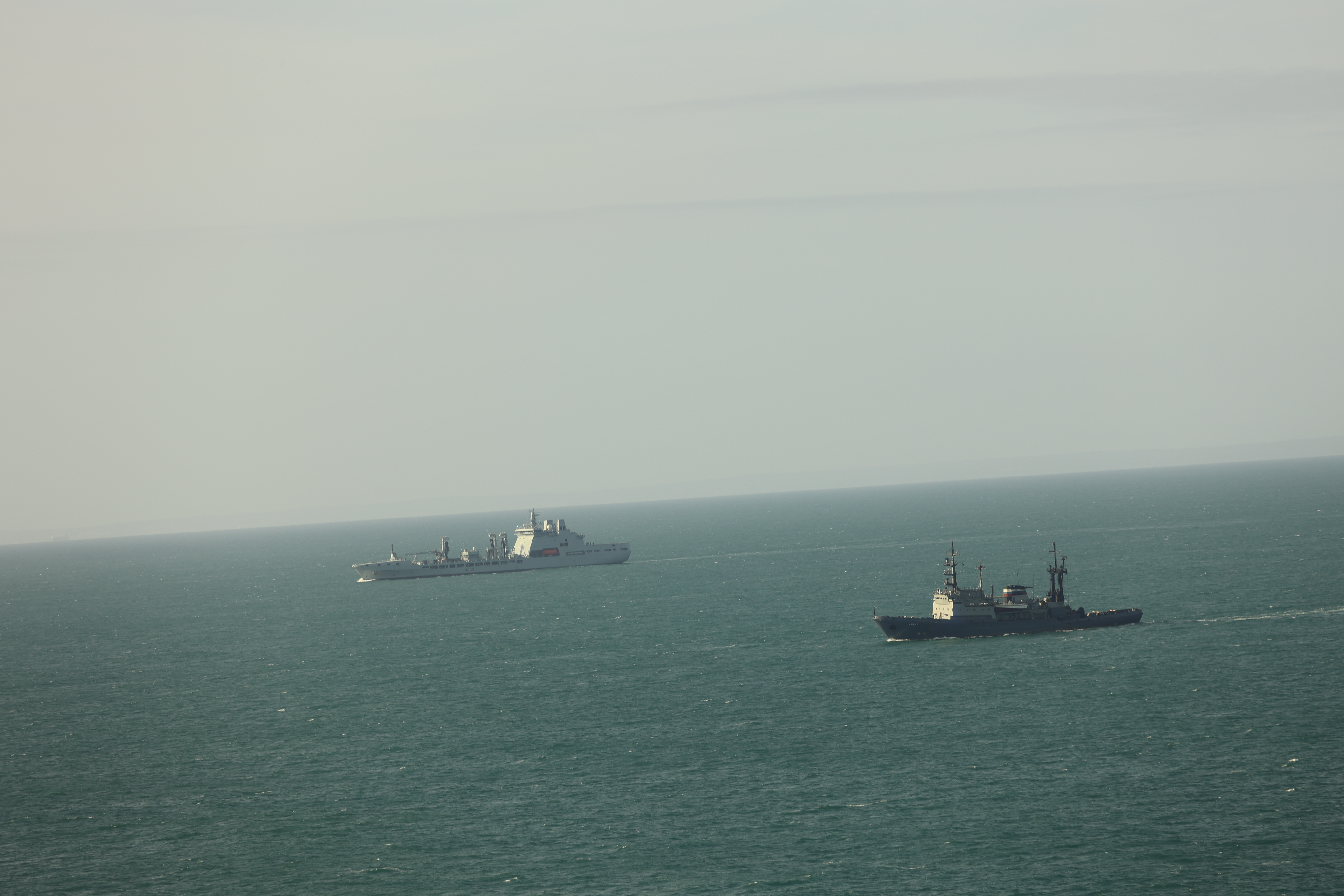 RFA Tideforce on monitoring duties with Russian tug Altay in the foreground