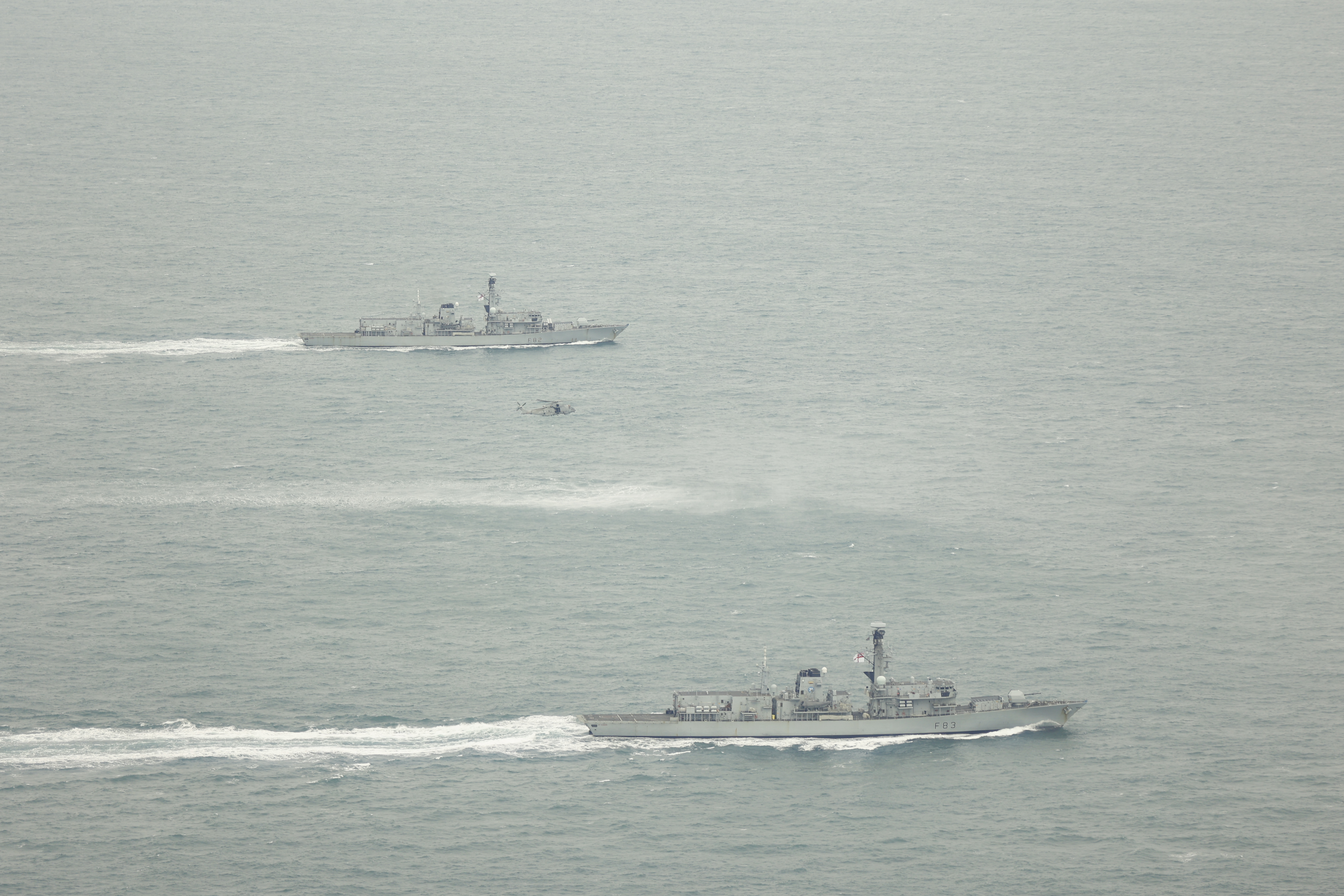 HMS St Albans nearest and HMS Somerset in the background with 814NAS Merlin in between