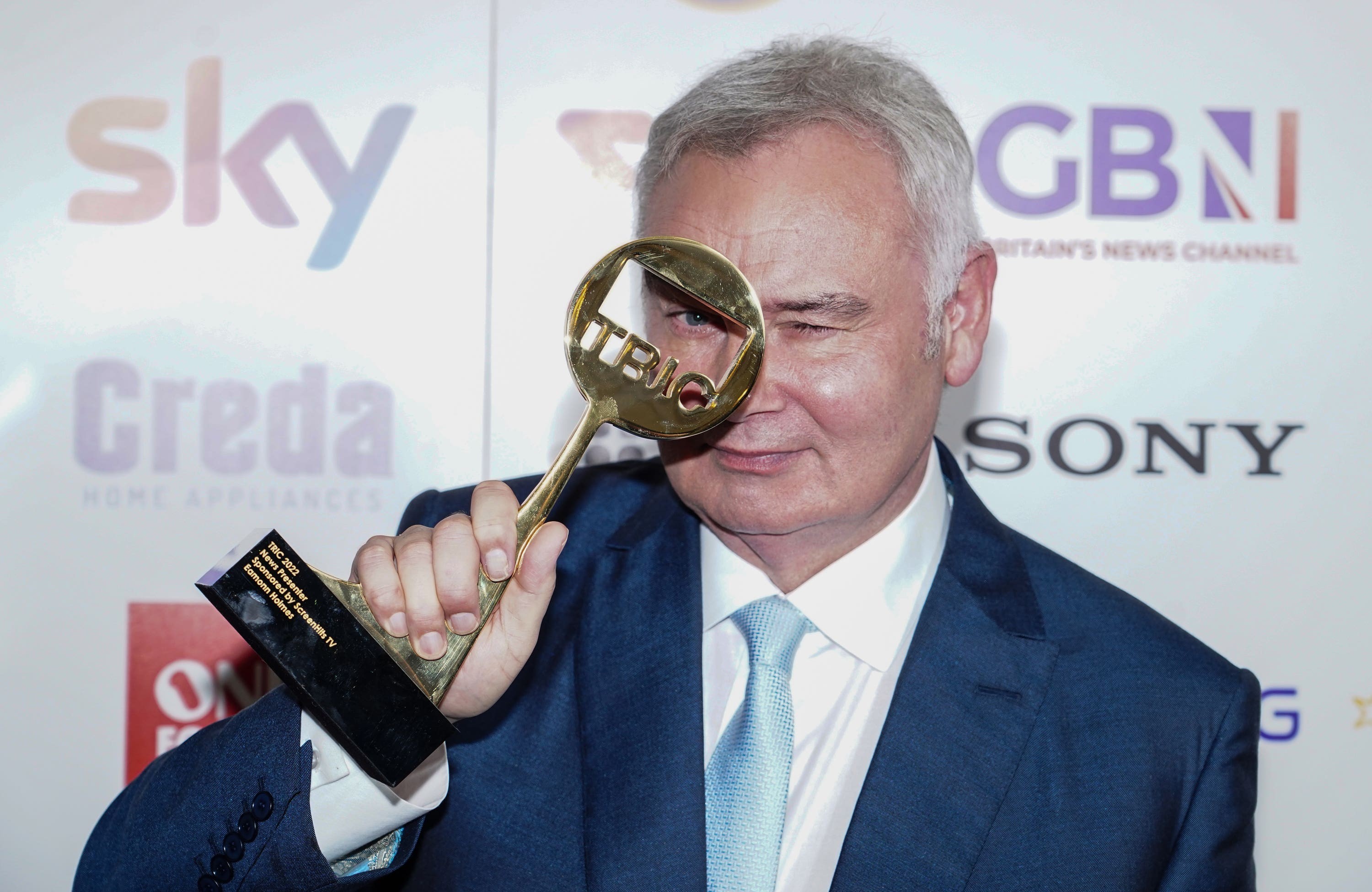 Eamonn Holmes with his news presenter of the year award at the Tric Awards
