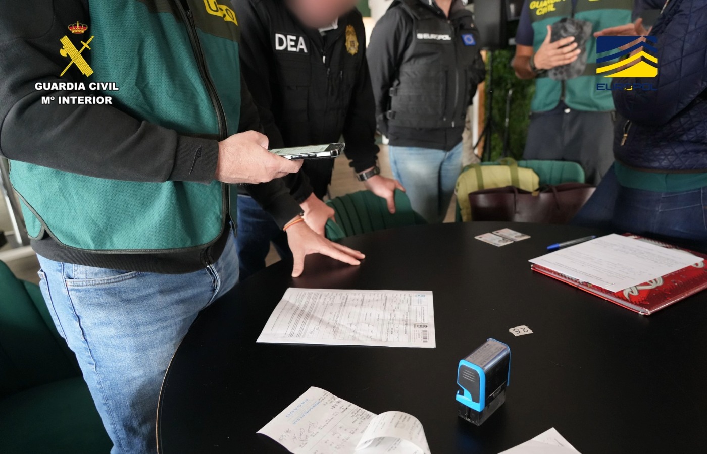 The Guardia Civil conducted raids in Spain - seizing documentation.