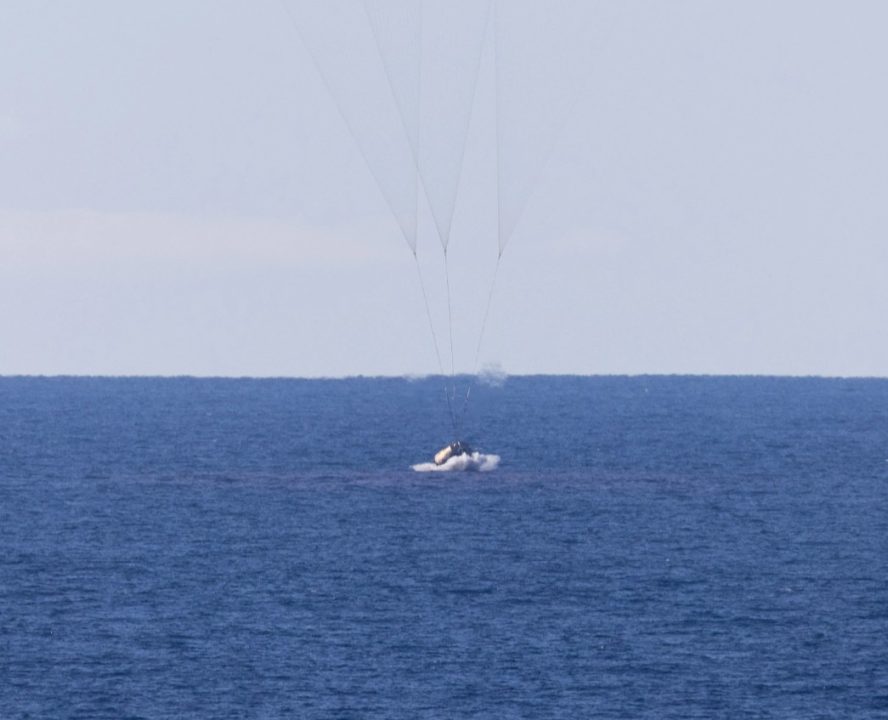 First manned Moon mission in more than 50 years splashes down after epic voyage