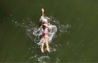 Scot sets new record with swim in crocodile-infested waters 