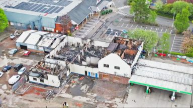 Fire crews battle blaze at Lanarkshire car garage