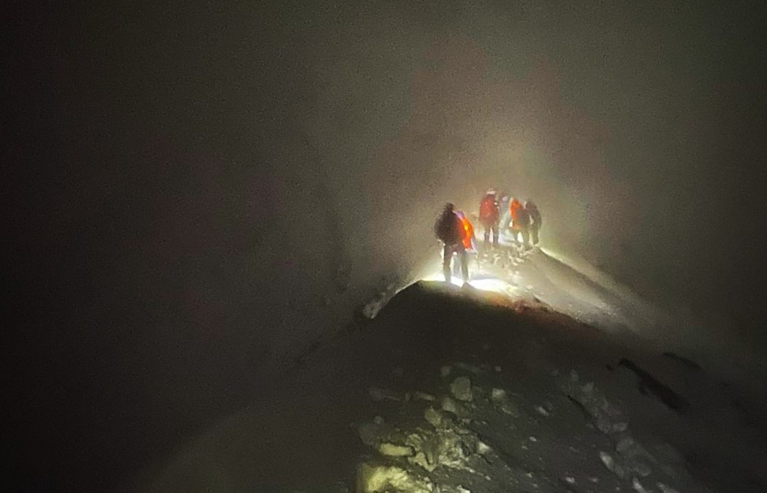 Walkers rescued after becoming stuck on mountain ridge without equipment