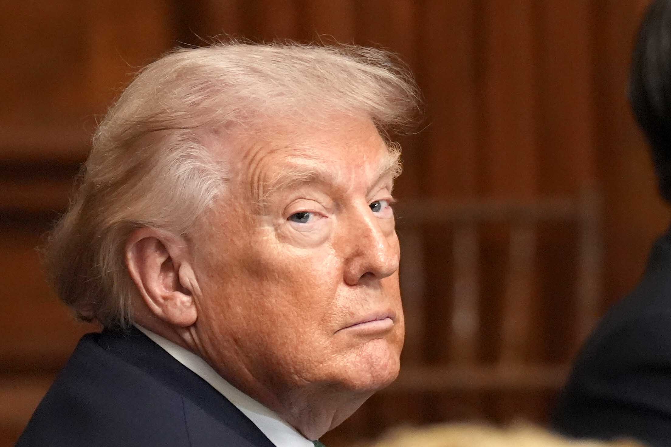 Donald Trump has urged Iran to reopen the key shipping artery of the Strait of Hormuz