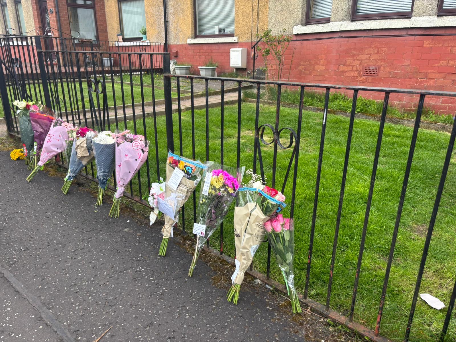 Floral tributes laid at the scene following the death of Elizabeth Colligan