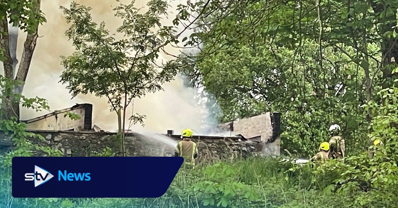 Fire crews tackle blaze in shed at derelict building in Muirhead | STV News