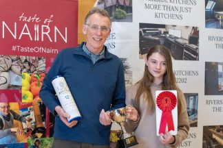 Porridge chieftain and 12-year-old girl share coveted tattie scone crown at Taste of Nairn
