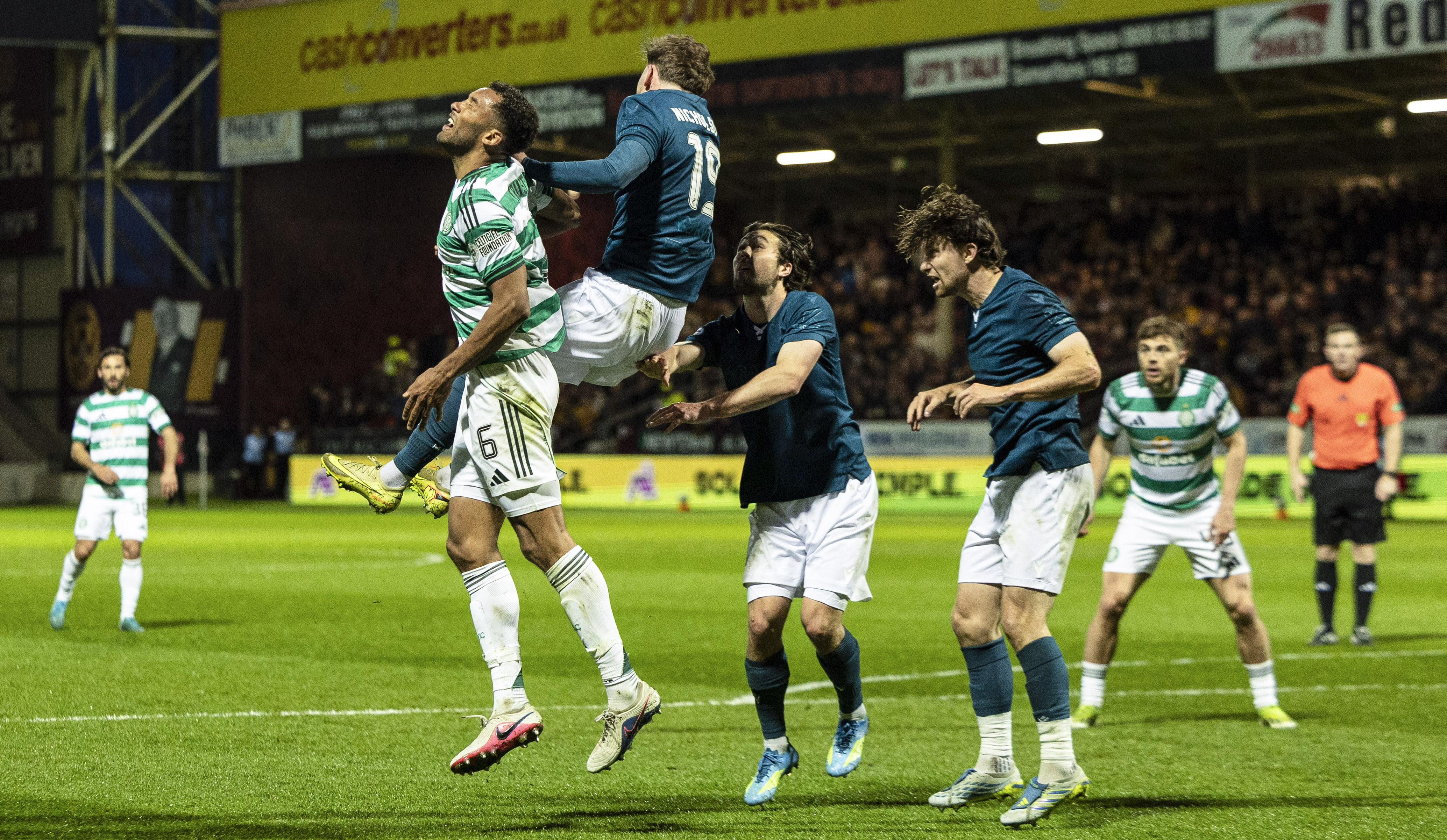 Motherwell's Sam Nicholson is penalised for a handball.