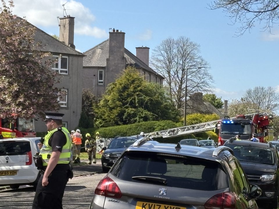 Firefighters battle blaze at Edinburgh block of flats as roads closed