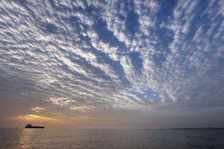 UK military says bulk carrier near Strait of Hormuz reports being attacked