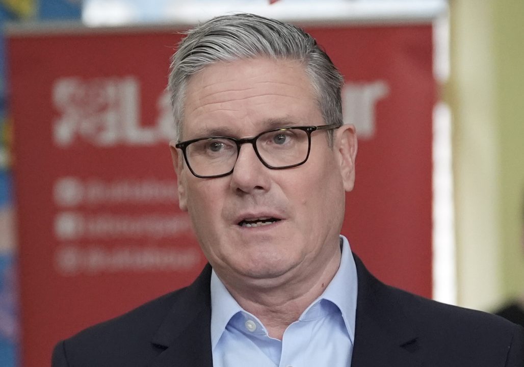Government aides quit as scores of Labour MPs call for Starmer to resign