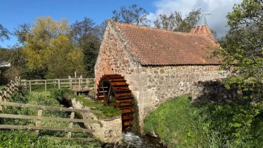 Mill which featured in Outlander grinds grain again