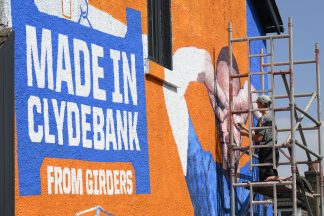 Giant John McGinn mural takes shape in Scotland star’s hometown