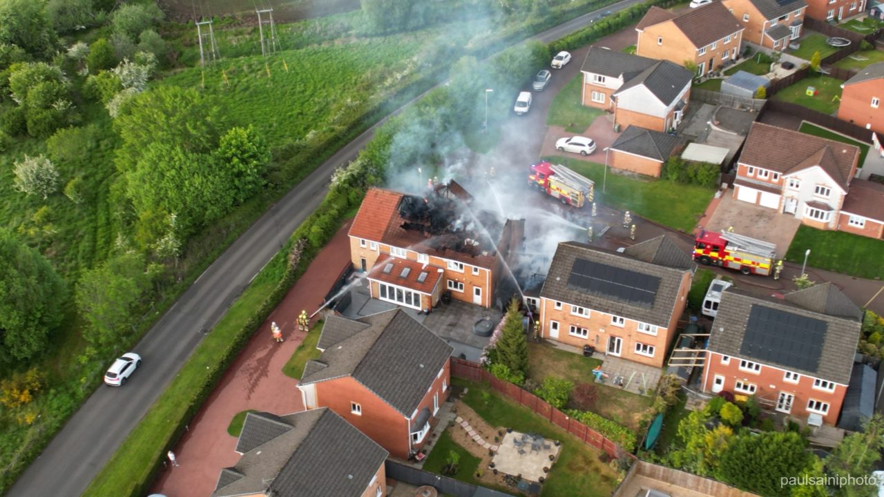 Four fire engines battle Glasgow house blaze for more than five hours