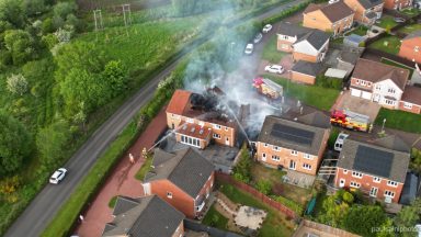 Four fire engines battle Glasgow house blaze for more than five hours