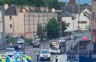 Woman seriously injured after being knocked down by bus in Glasgow