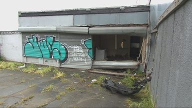 Teens in hospital after car crashes into Edinburgh building as 17-year-old arrested