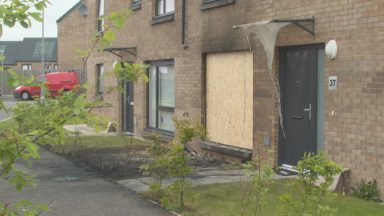 Car driven into Glasgow home and set alight amid ongoing gang war