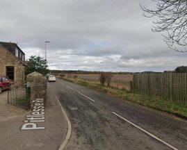 Woman assaulted after stopping car for man who pretended to be injured