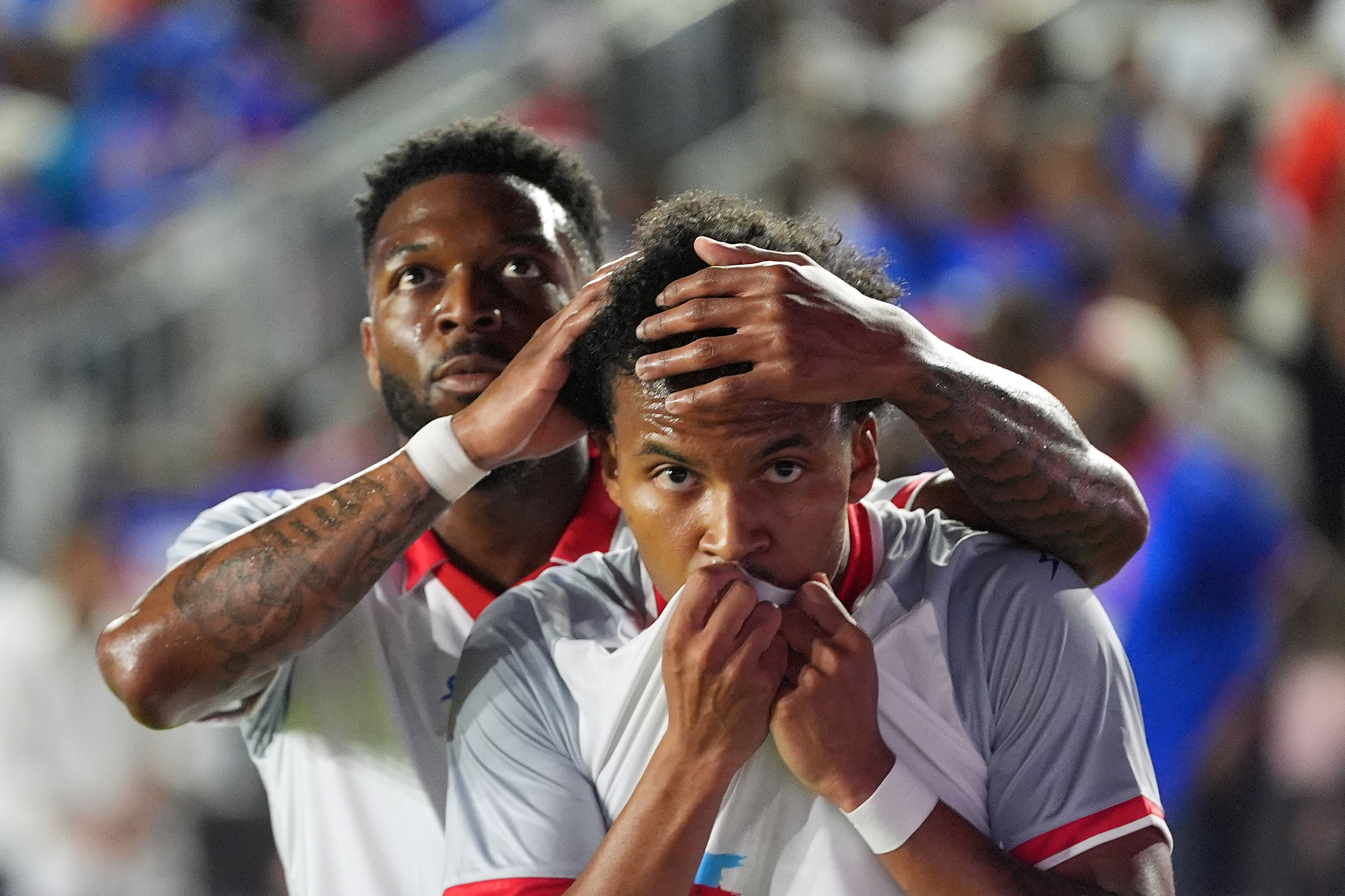 Haiti forward Ruben Providence, front, celebrates with forward Josué Casimir after scoring his side's first goal during an international friendly soccer match against New Zealand, Tuesday, June 2, 2026, in Fort Lauderdale, Fla. (AP Photo/Rebecca Blackwell)