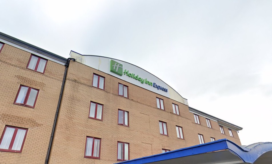 Woman in court charged with hate crime after protest at asylum hotel in Greenock