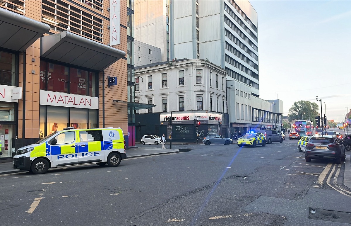 Police descended on Glasgow on Tuesday evening as crowds of people dressed all in black gathered in the city centre.