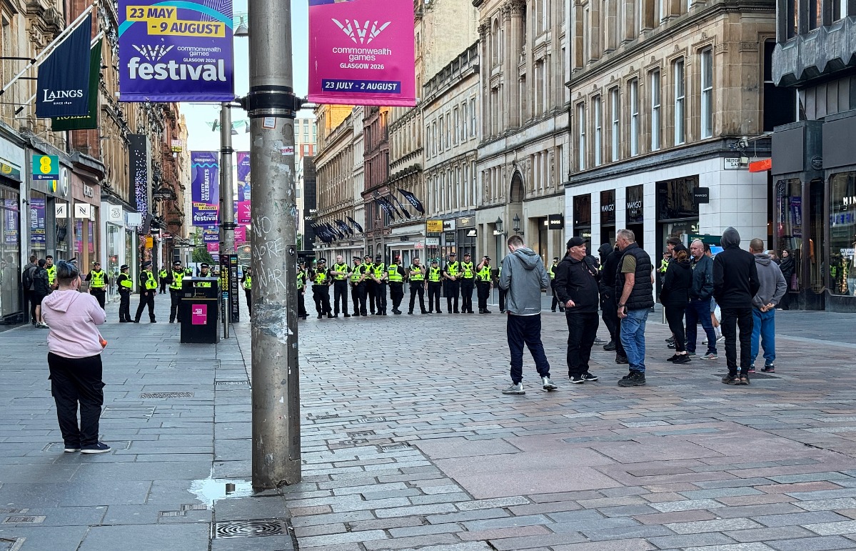 Dozens of officers, riot vans, and a helicopter were deployed, with a large presence near St Enoch shopping centre and Buchanan Street.
