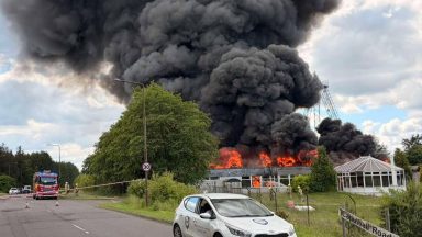 Firefighters battle large blaze at Livingston industrial estate as thick smoke billows from building