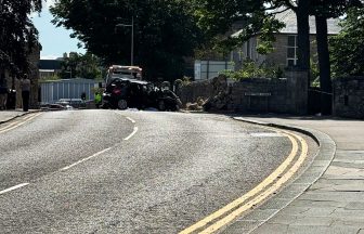Three men in hospital after car crashes into wall in St Andrews
