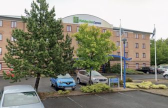 Three police officers injured during Greenock protest in wake of Belfast stabbing