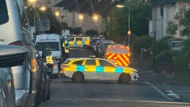 Man charged after late-night police raid at Fife home