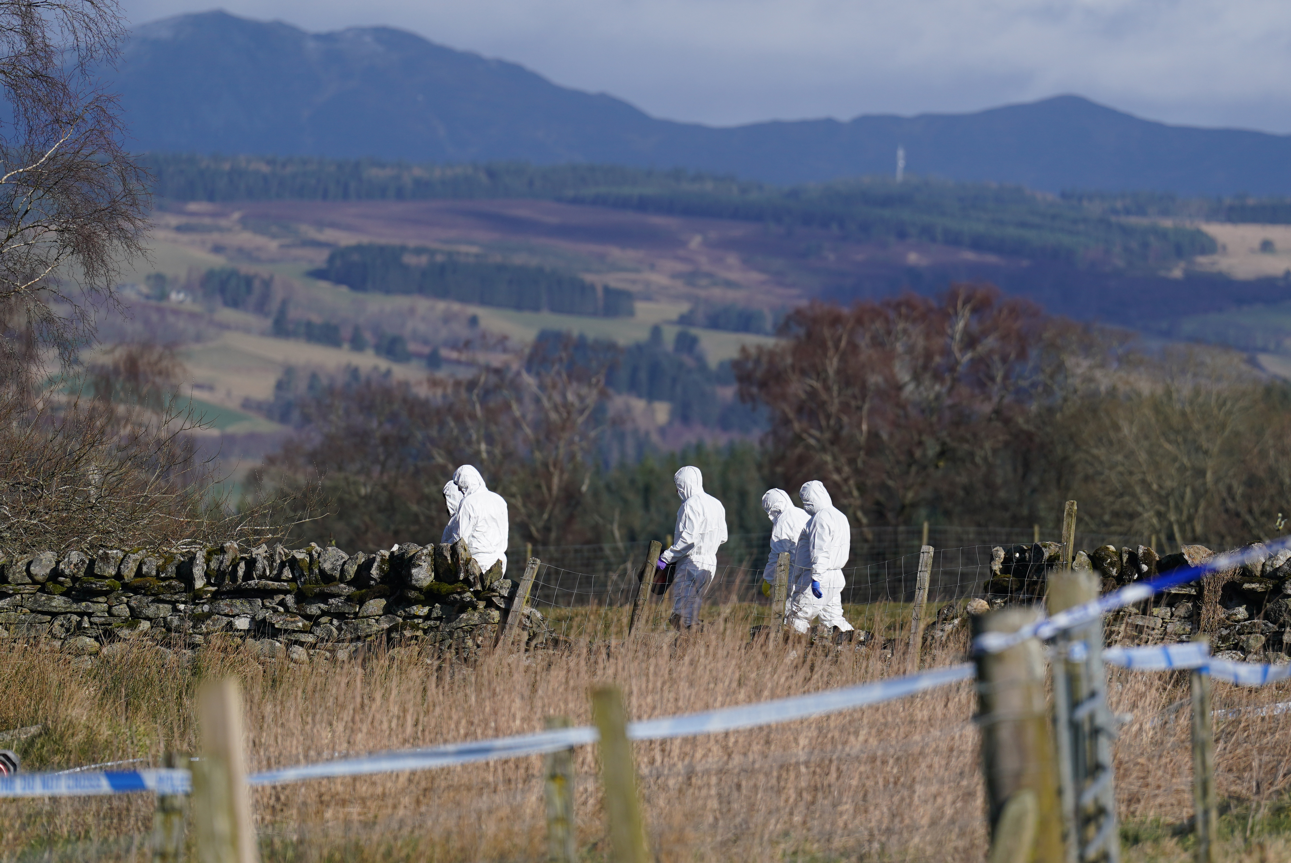 Police at the scene in the Pitilie area on the outskirts of Aberfeldy, Perthshire after 65-year-old Brian Low was found dead next to his dog, he had suffered a fatal gun shot wound. Picture date: Thursday February 29, 2024.