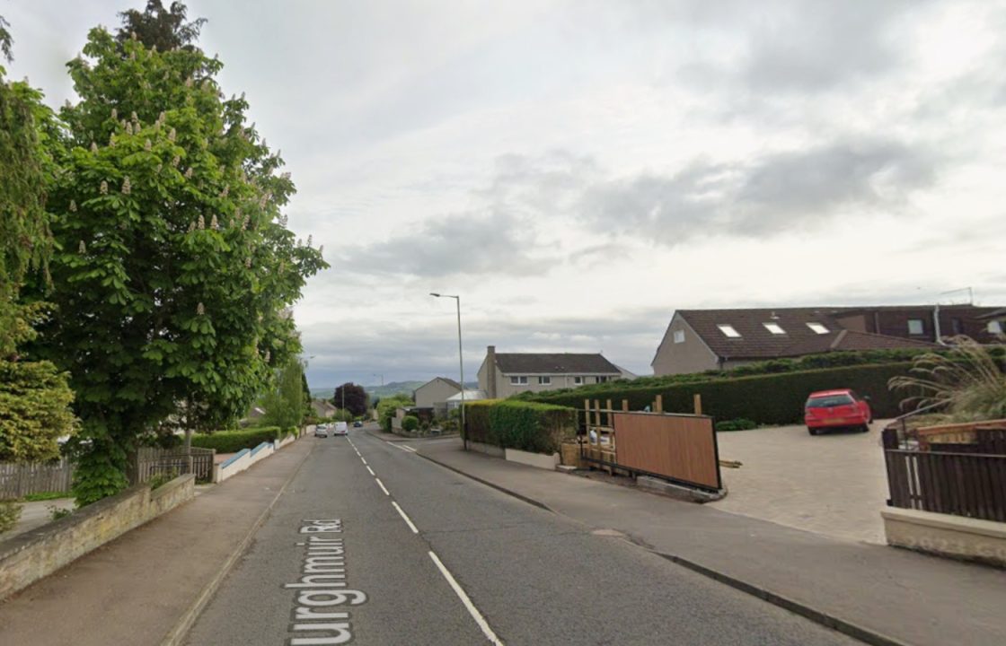Search for driver who fled scene with suitcase after crashing into parked truck