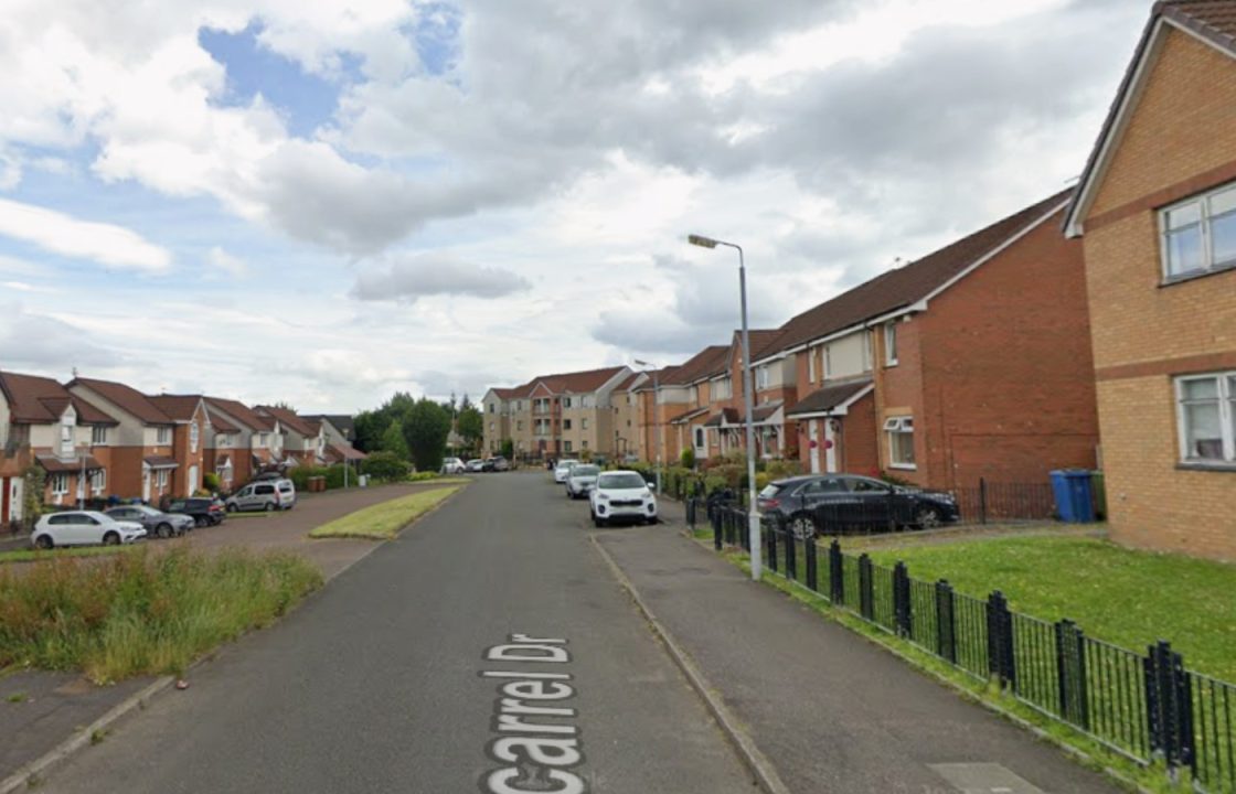 Hunt for driver after pedestrian struck by car which crashed into railings in Glasgow