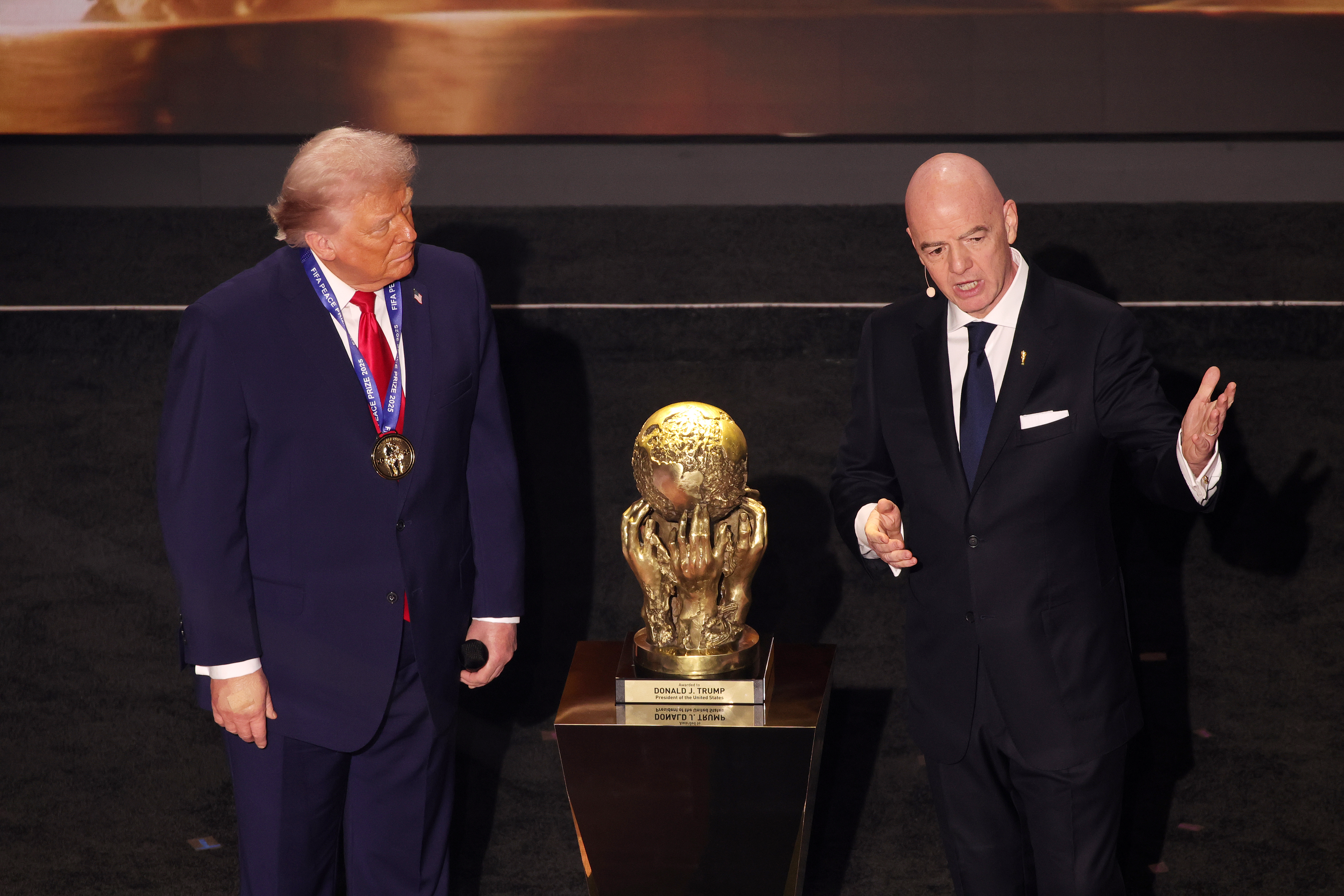 US President Donald Trump, left, has thanked FIFA for “reversing a great injustice” in regard to Balogun