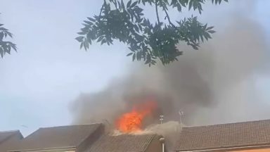 Firefighters tackle house blaze after smoke seen coming from property