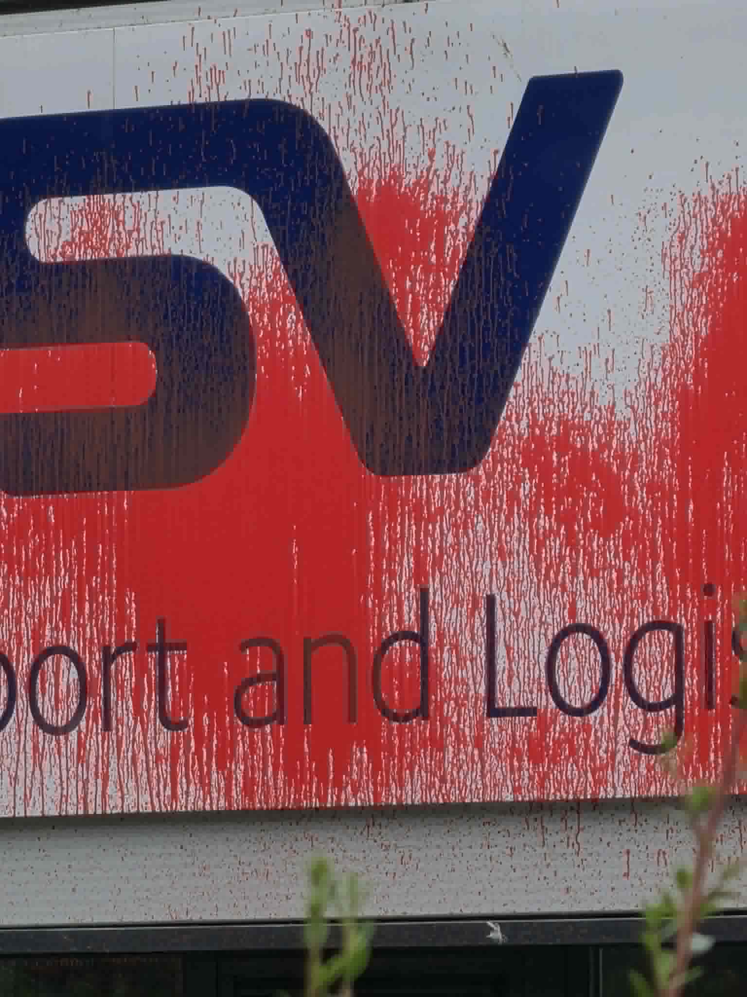 The red paint covered the main sign.