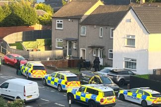 Large police presence outside Kilmarnock house as street taped off