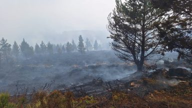 Cairngorms wildfire enters 13th day as crews work to limit spread