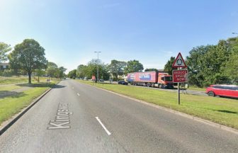 Pedestrian in hospital after being struck by motorcycle as road closed