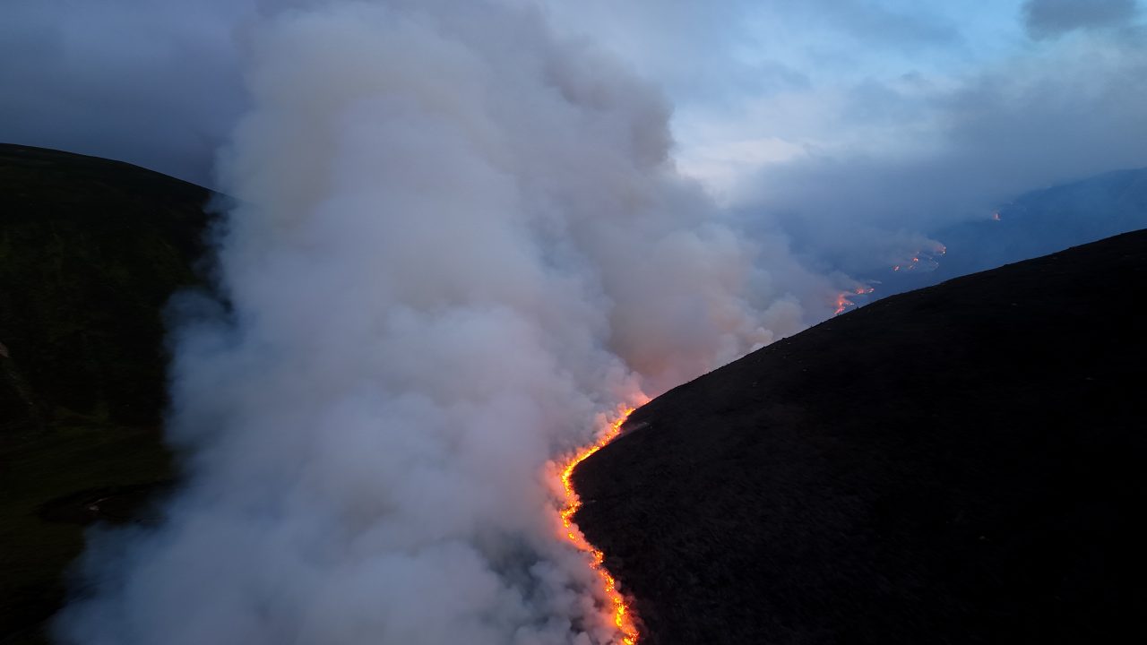‘Scene of devastation’: Cairngorms wildfire burning underground as battle continues