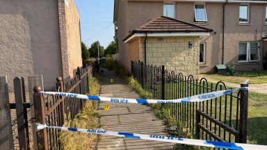 Man found seriously injured in Edinburgh stairwell as police hunt attacker